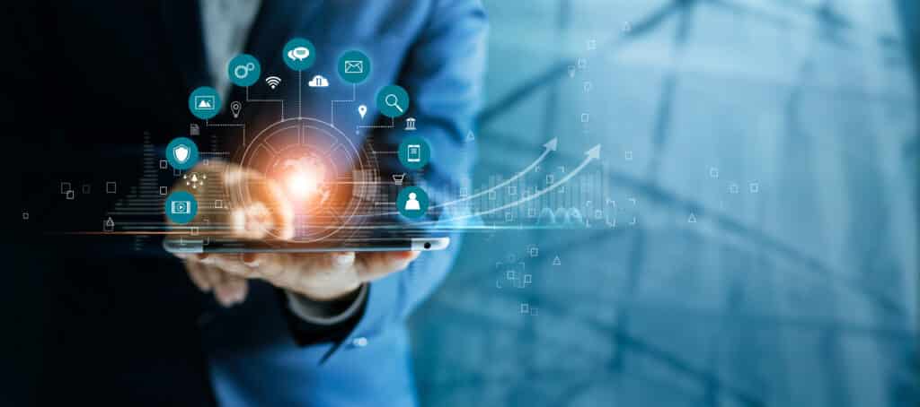 Businessman using tablet analyzing sales data and economic growth graph chart, Technology and icon customer global network connection. Business strategy. Innovative. Digital marketing.