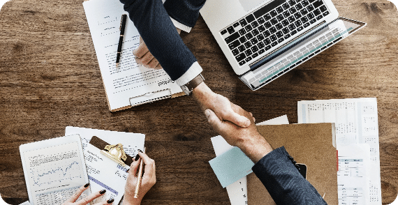 business-people-shaking-hands-together